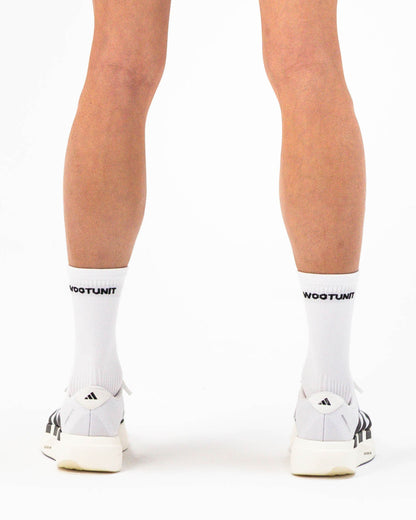Calzini sportivi bianchi unisex WOOTUNIT altezza media per running Made in Italy vista posteriore