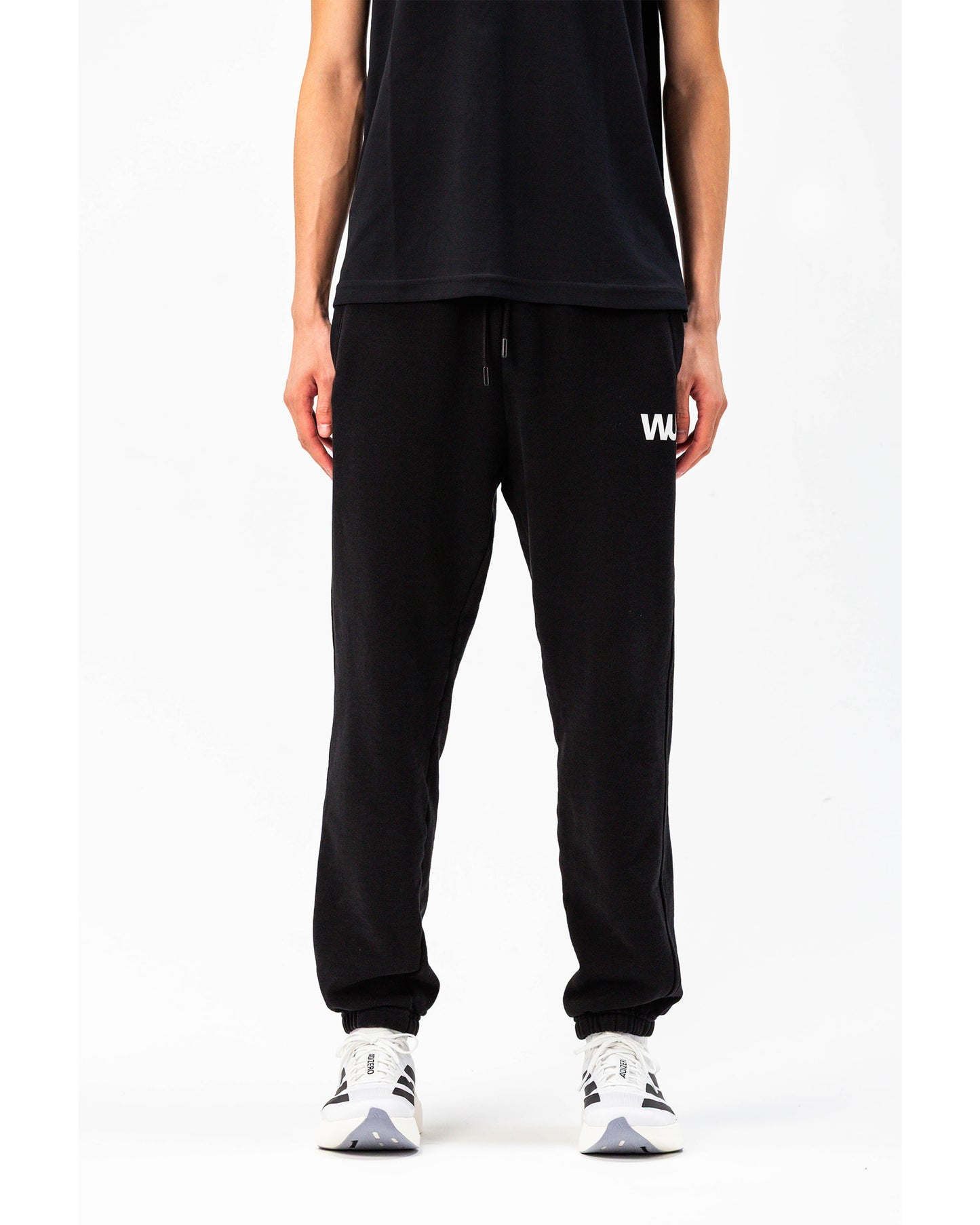 Pantaloni tuta Essential WOOTUNIT vista frontale tre quarti
