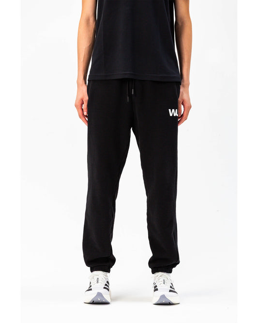 Pantaloni tuta Essential WOOTUNIT vista frontale tre quarti
