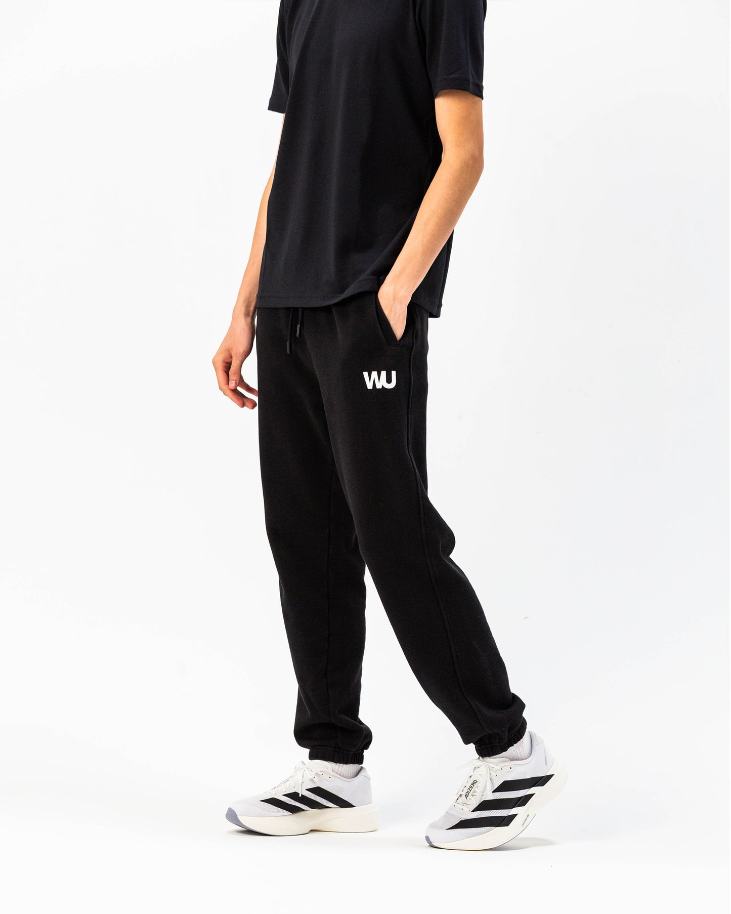 Pantaloni tuta Essential WOOTUNIT vista laterale tre quarti
