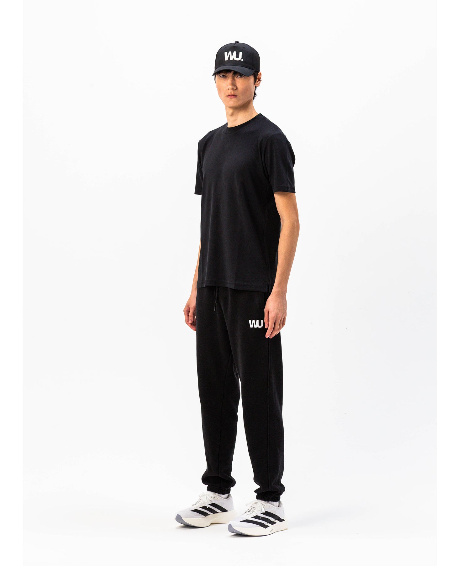 Pantaloni tuta Essential WOOTUNIT vista laterale intera