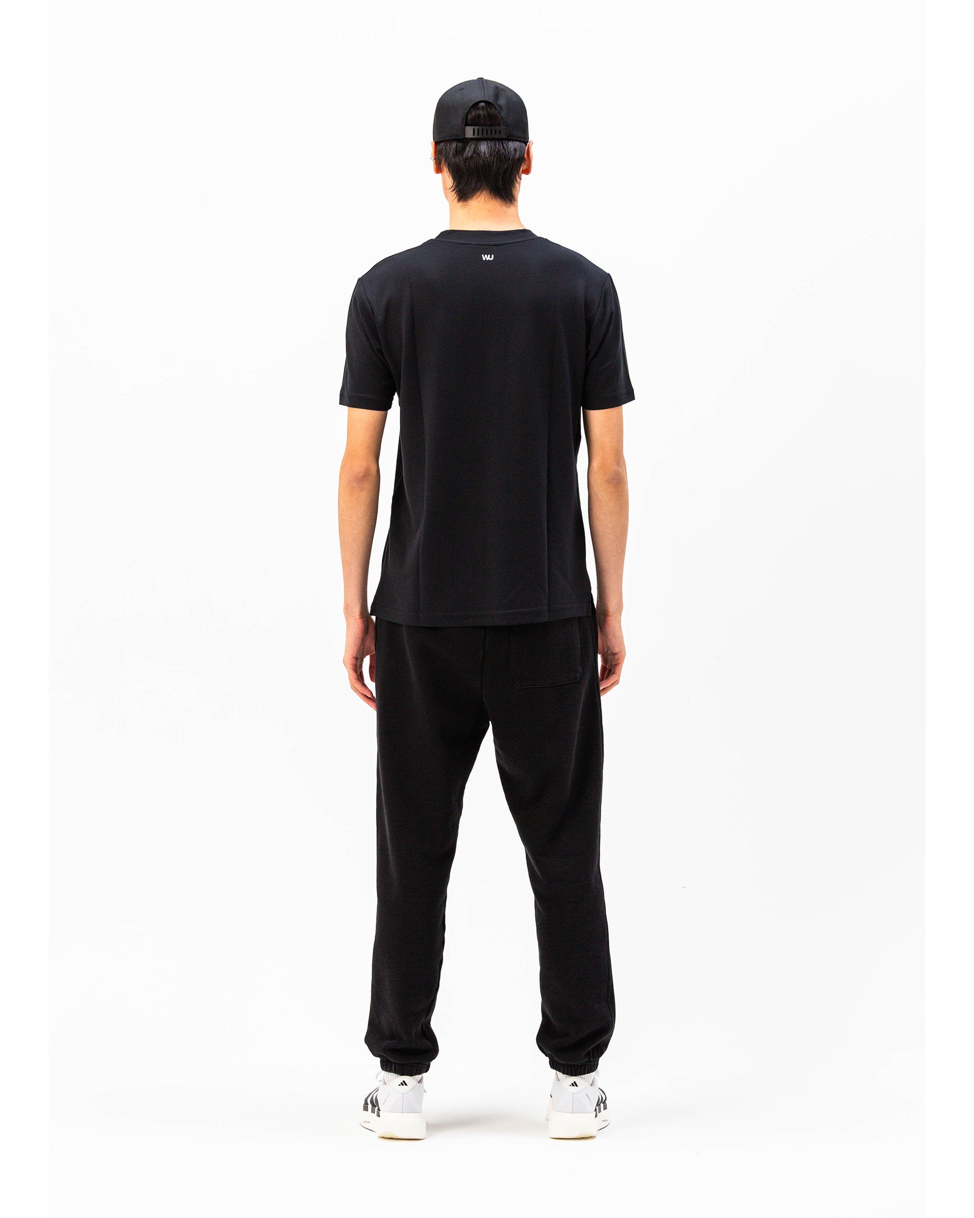 Pantaloni tuta Essential WOOTUNIT vista posteriore intera
