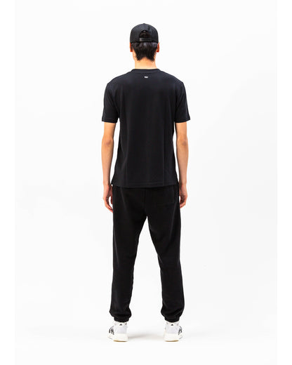 Pantaloni tuta Essential WOOTUNIT vista posteriore intera
