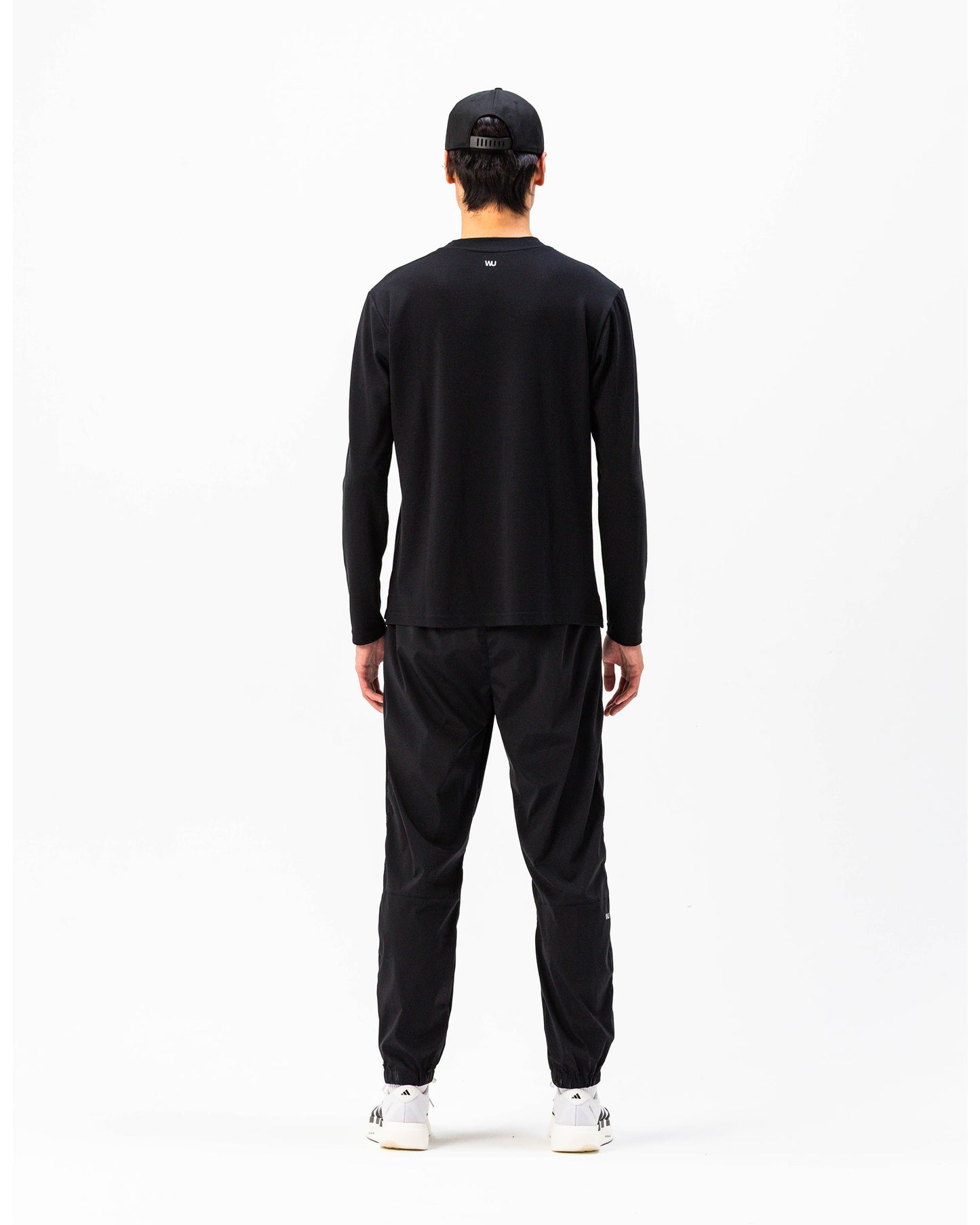 Pantaloni Performance WOOTUNIT vista posteriore intera
