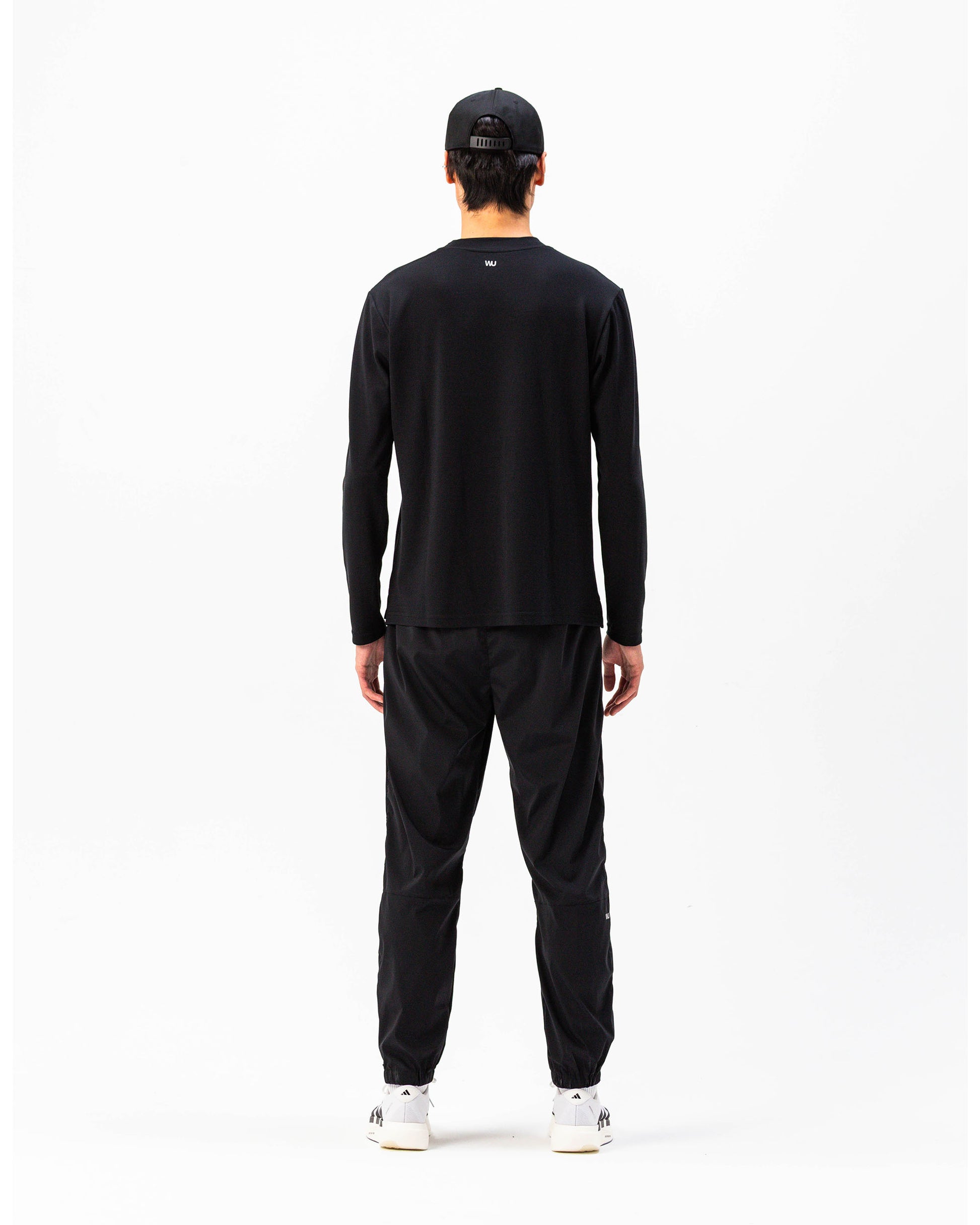 Pantaloni Performance WOOTUNIT vista posteriore intera
