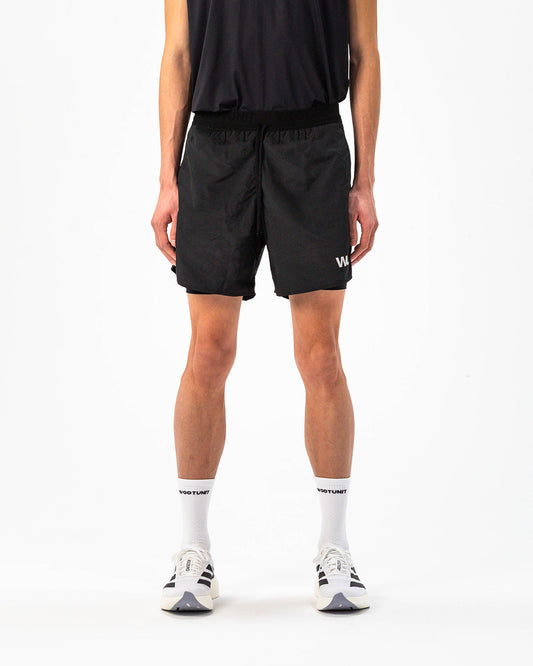 Pantaloncini Performance 2-in-1 WOOTUNIT vista frontale tre quarti
